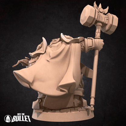 Armored dwarf priest holding a hammer staff and religious book